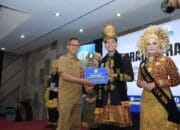 M Faris Al Muzakki dan Fania Shella Farahma Raja dan Ratu Baca Aceh 2024