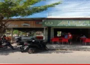 Nikmati Secangkir Kopi Sambil Mengamati Aktivitas Bus di AW Kopi