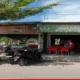 Nikmati Secangkir Kopi Sambil Mengamati Aktivitas Bus di AW Kopi