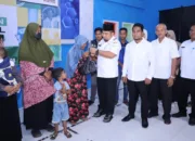 Peringati HKSN, Pj Bupati Aceh Besar Kembali Salurkan Bantuan Sosial