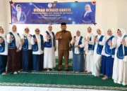 Pj Bupati Aceh Besar Bersama IWAPI Bagikan Makanan Bergizi di SD Mon Singet